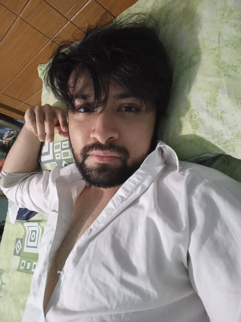 Dr. Hasnain Siraj Memon with shiny, dense black hair in a casual moment